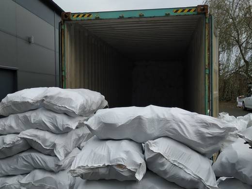 TFN Ventures 25kg bags of used shoes loaded into export container 1